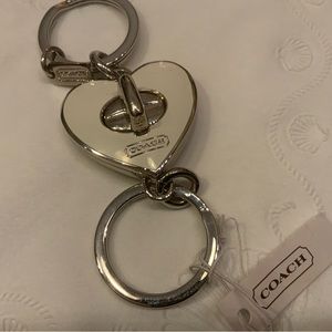 Coach White Dual Twist Lock key chain
